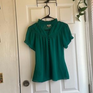 Emerald green sheer ruffle neck blouse with ruffle shirt sleeves